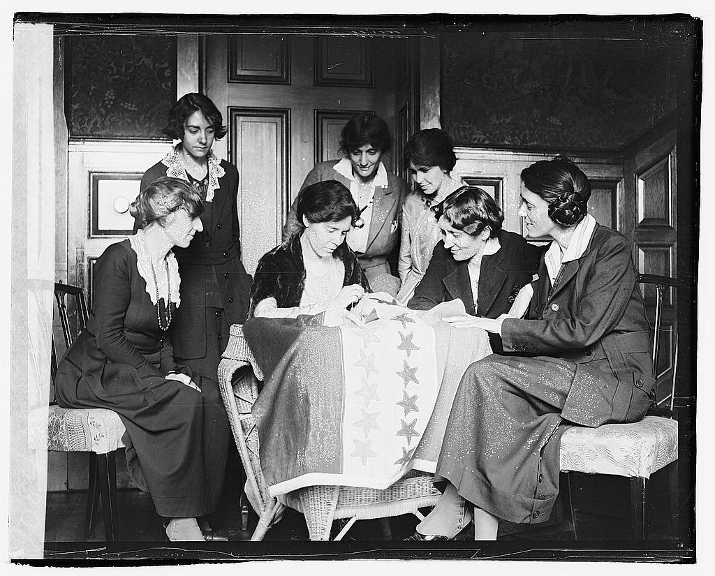 Sewing Stars on Suffrage Flag